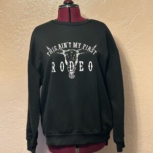 Black This ain’t my first rodeo Women's Sweatshirt size Large